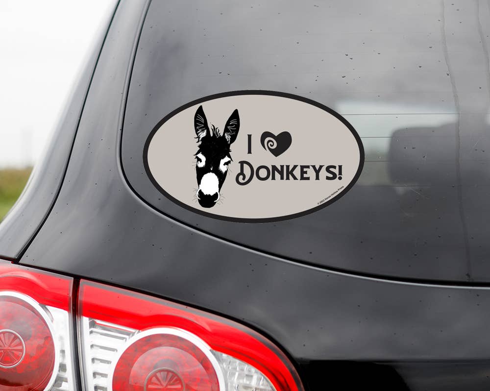 Car decal with a donkey design and 'I ❤️ Donkeys!' text on a vehicle.